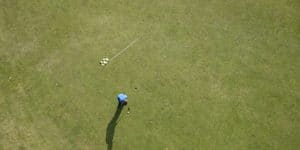aerial photo of man playing golf