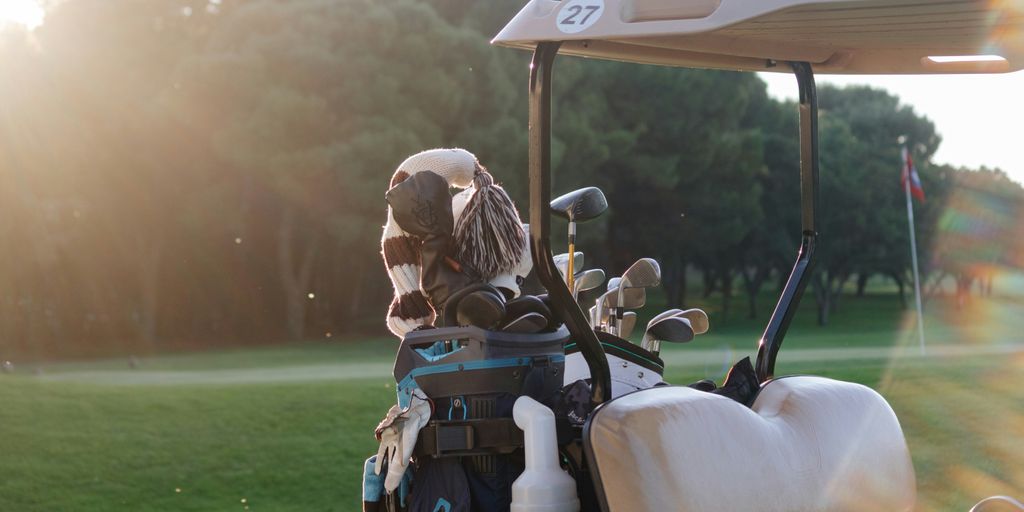 a golf cart with a bag of golf clubs