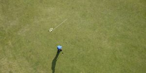 aerial photo of man playing golf